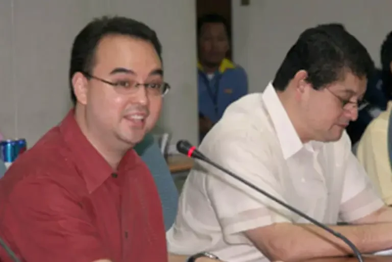 Alan Peter Cayetano participates in a meeting or discussion, possibly related to government or policy matters.