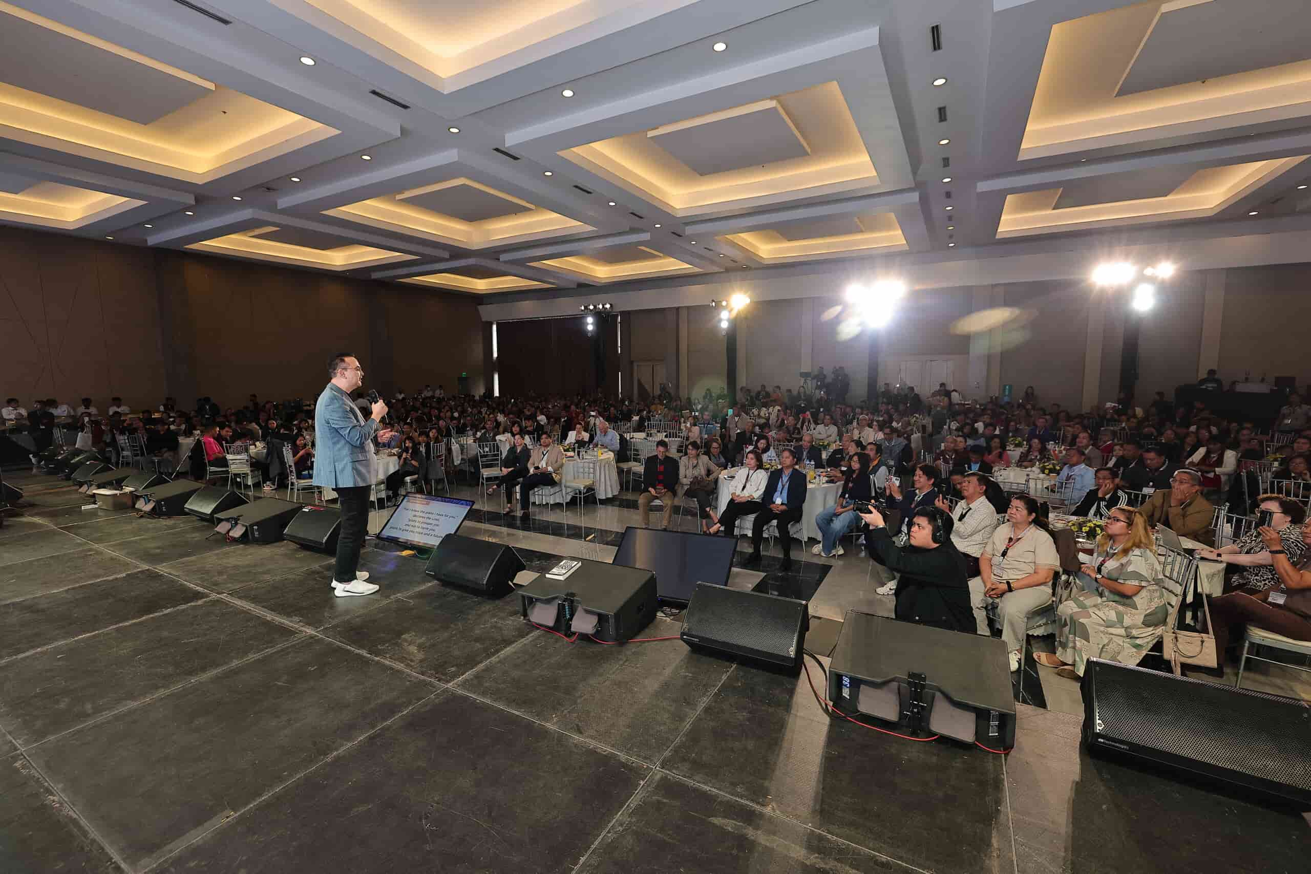 Senator Alan Peter Cayetano speaking on stage during the Transformnation event
